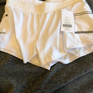 White Fabletics shorts